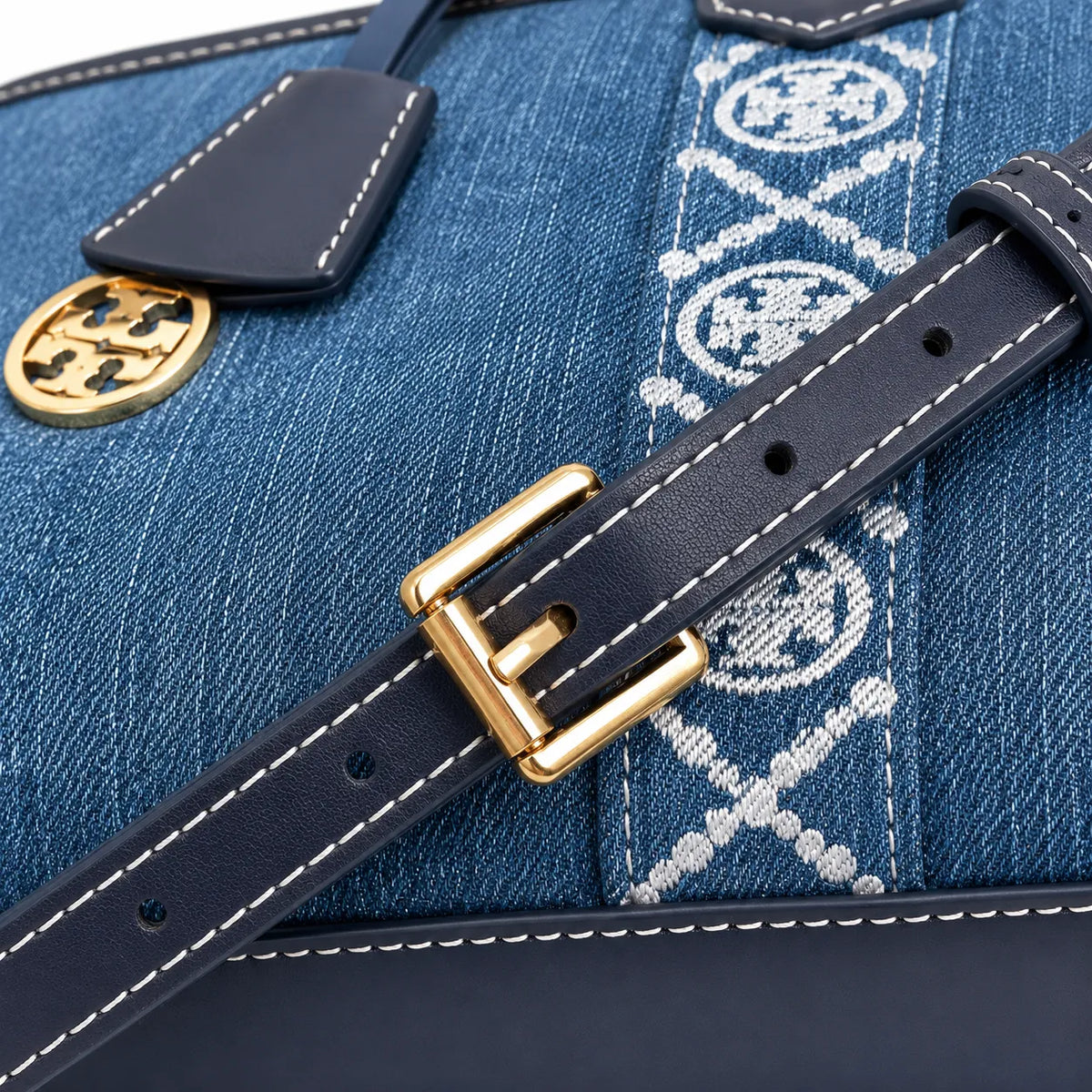 Tory Burch Perry | Blue washed denim  white embroidered T-logo stripes  navy leather trim and gold charm  double handles and adjustable shoulder strap  women's designer shoulder bag