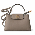 Tory Burch Britten | Grey-brown pebbled leather with gold double T logo  adjustable shoulder strap  women's designer handbag