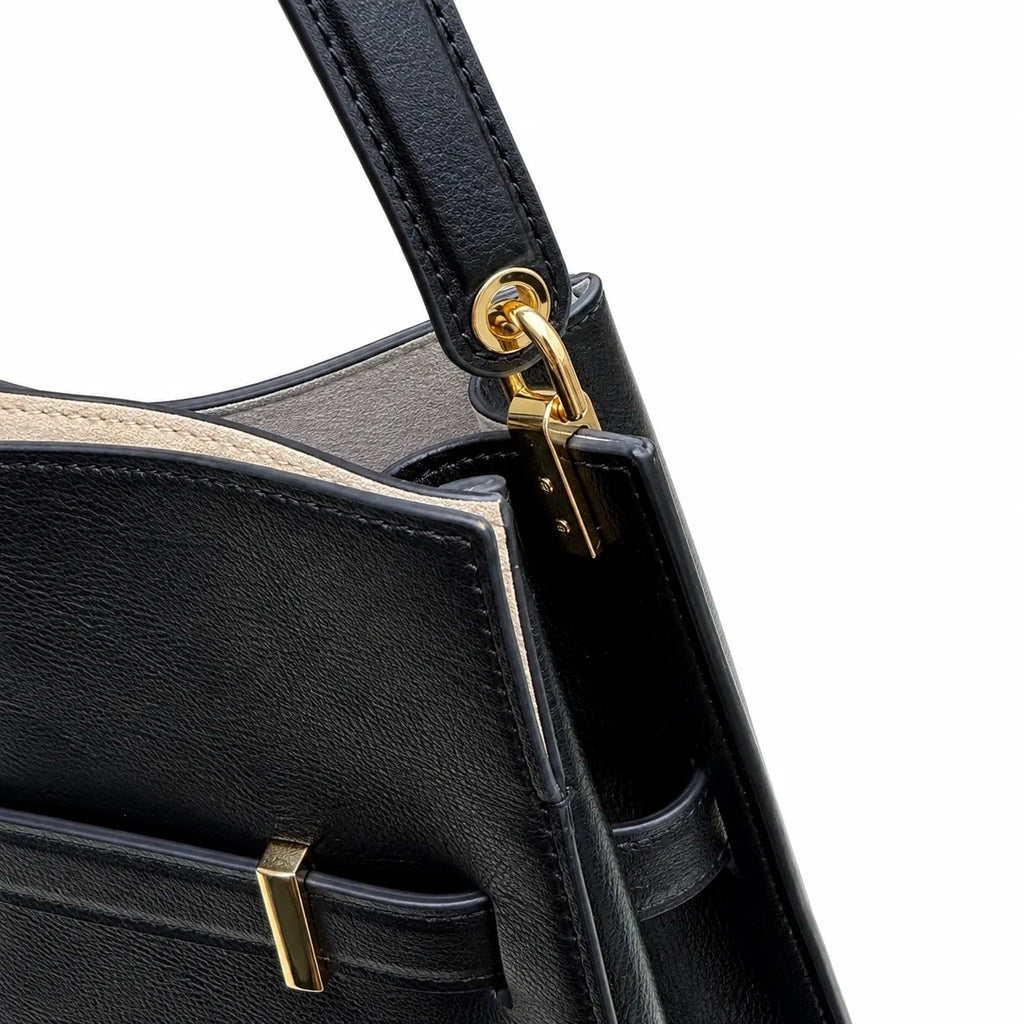 Tory Burch Lee Radziwill | Black pebbled leather with gold twist clasp and double T logo adjustable shoulder strap women's designer handbag