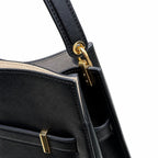Tory Burch Lee Radziwill | Black pebbled leather with gold twist clasp and double T logo adjustable shoulder strap women's designer handbag