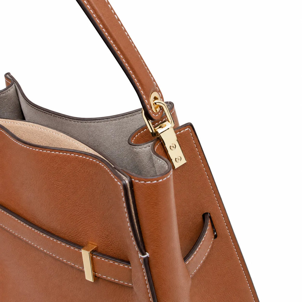 Tory Burch Lee Radziwill | Caramel-colored smooth leather  gold twist clasp and double T logo  women's designer handbag