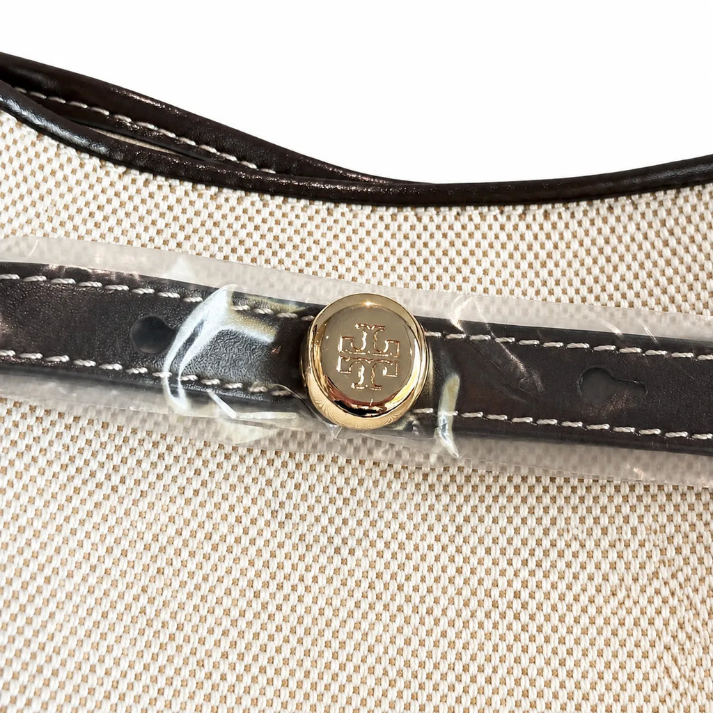 Tory Burch Romy | Off-white women's designer handbag with brown leather trim and drawstring closure adorned with the iconic double-T logo
