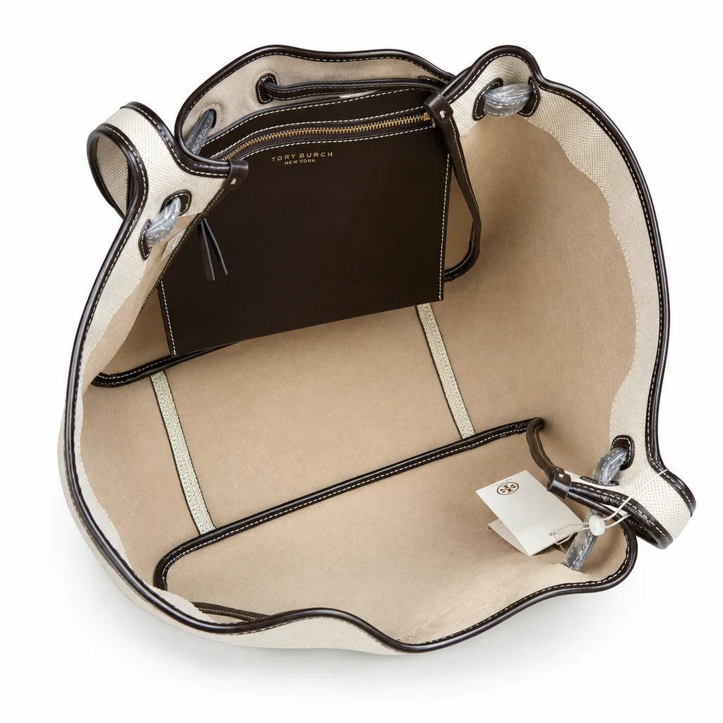 Tory Burch Romy | Off-white women's designer handbag with brown leather trim and drawstring closure adorned with the iconic double-T logo