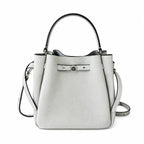 Tory Burch Romy | Light grey pebbled leather with signature logo buckle  adjustable shoulder strap  women's designer handbag