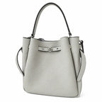 Tory Burch Romy | Light grey pebbled leather with signature logo buckle  adjustable shoulder strap  women's designer handbag