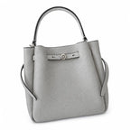 Tory Burch Romy | Light grey pebbled leather with signature logo buckle  adjustable shoulder strap  women's designer handbag