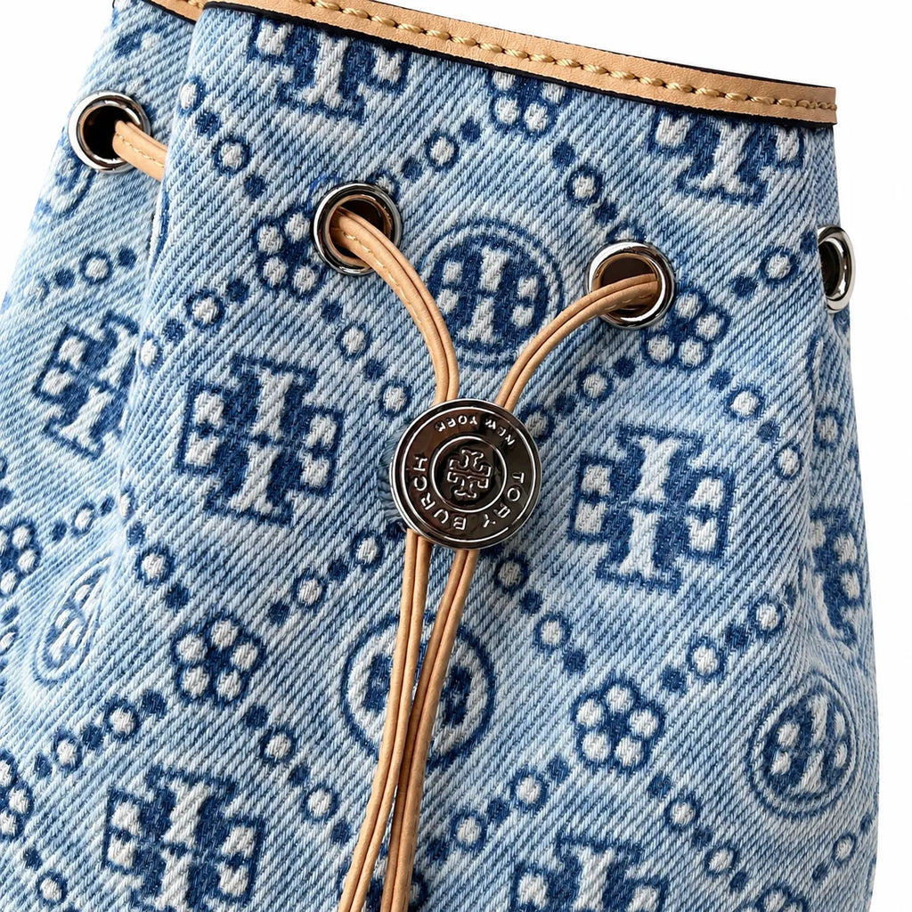 Tory Burch T Monogram | Powder blue washed denim with brown leather trim signature double T drawstring closure women's designer handbag
