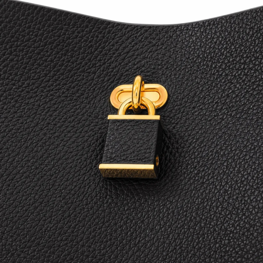 Tory Burch Slim Lock | Black pebbled leather adjustable shoulder strap  women's designer handbag