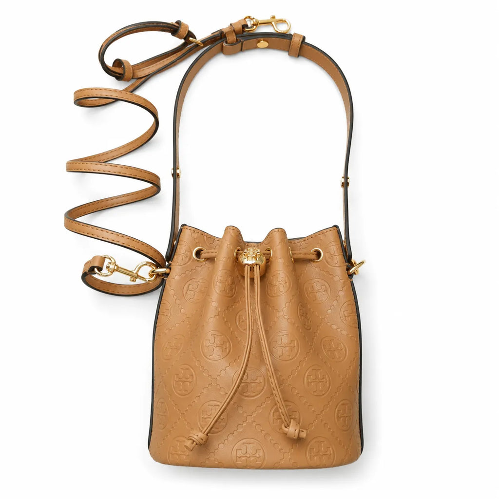 Tory Burch T Monogram | Tan pebbled leather with embossed logo  gold drawstring closure  women's designer handbag