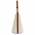 Tory Burch Blake | Off-white woven fabric with brown leather trim  iconic double-T logo   adjustable shoulder strap  women's designer handbag