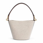 Tory Burch Blake | Off-white woven fabric with brown leather trim  iconic double-T logo   adjustable shoulder strap  women's designer handbag