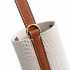Tory Burch Blake | Off-white woven fabric with brown leather trim  iconic double-T logo   adjustable shoulder strap  women's designer handbag