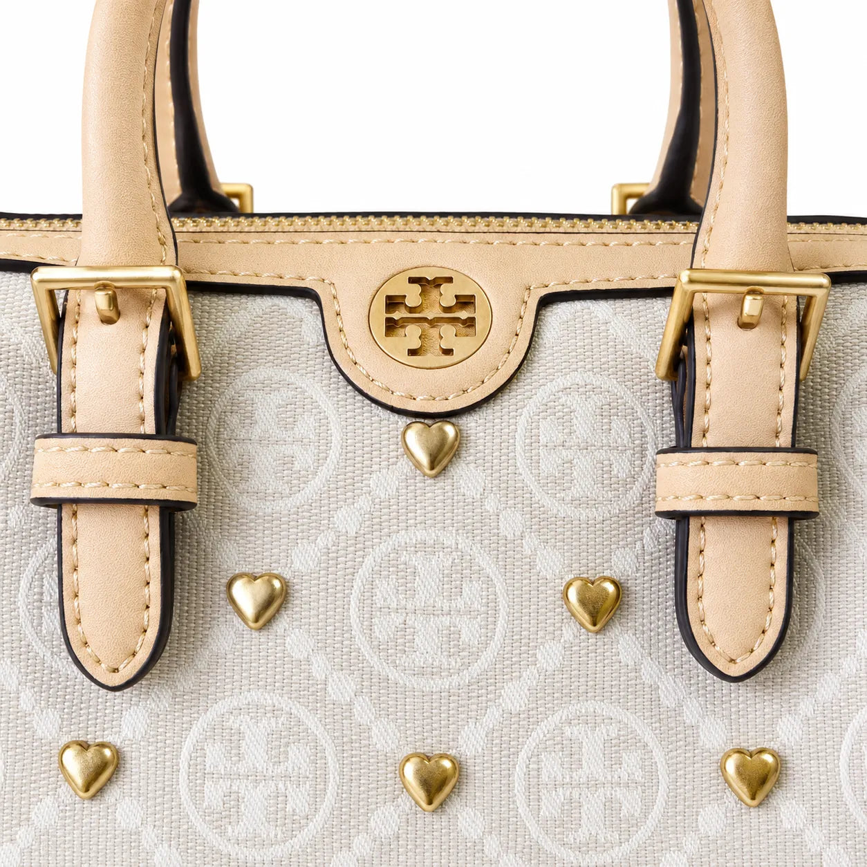 Tory Burch T Monogram | Ivory canvas with tan leather trim  gold heart studs and double T logo adjustable shoulder strap   women's designer handbag