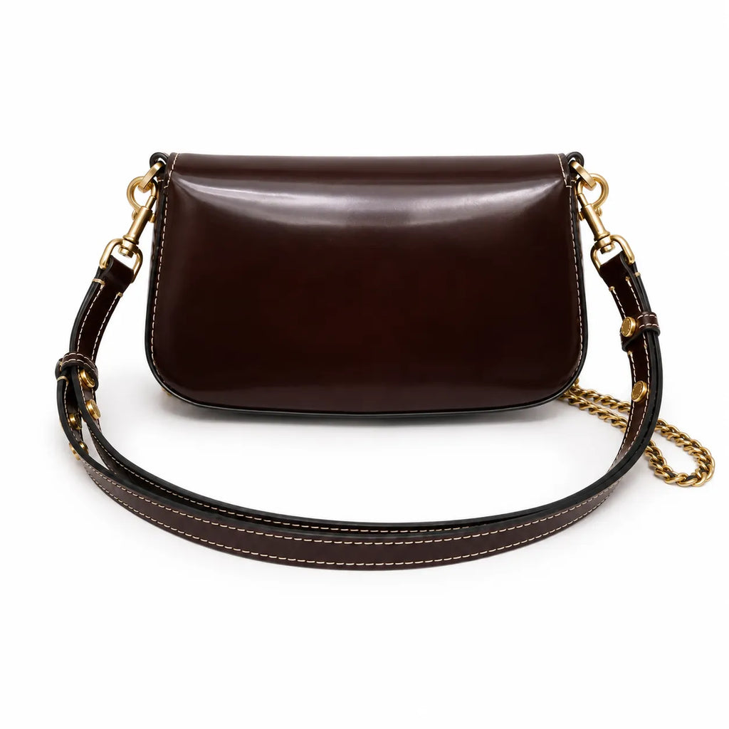 Tory Burch Britten | Tempranillo patent leather  detachable chain and leather shoulder strap multiple carrying options women's designer handbag