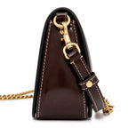 Tory Burch Britten | Tempranillo patent leather  detachable chain and leather shoulder strap multiple carrying options women's designer handbag