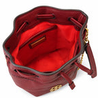 Tory Burch Willa | Burgundy lambskin leather adorned with a gold double-T logo detachable chain shoulder strap drawstring closure women's designer handbag