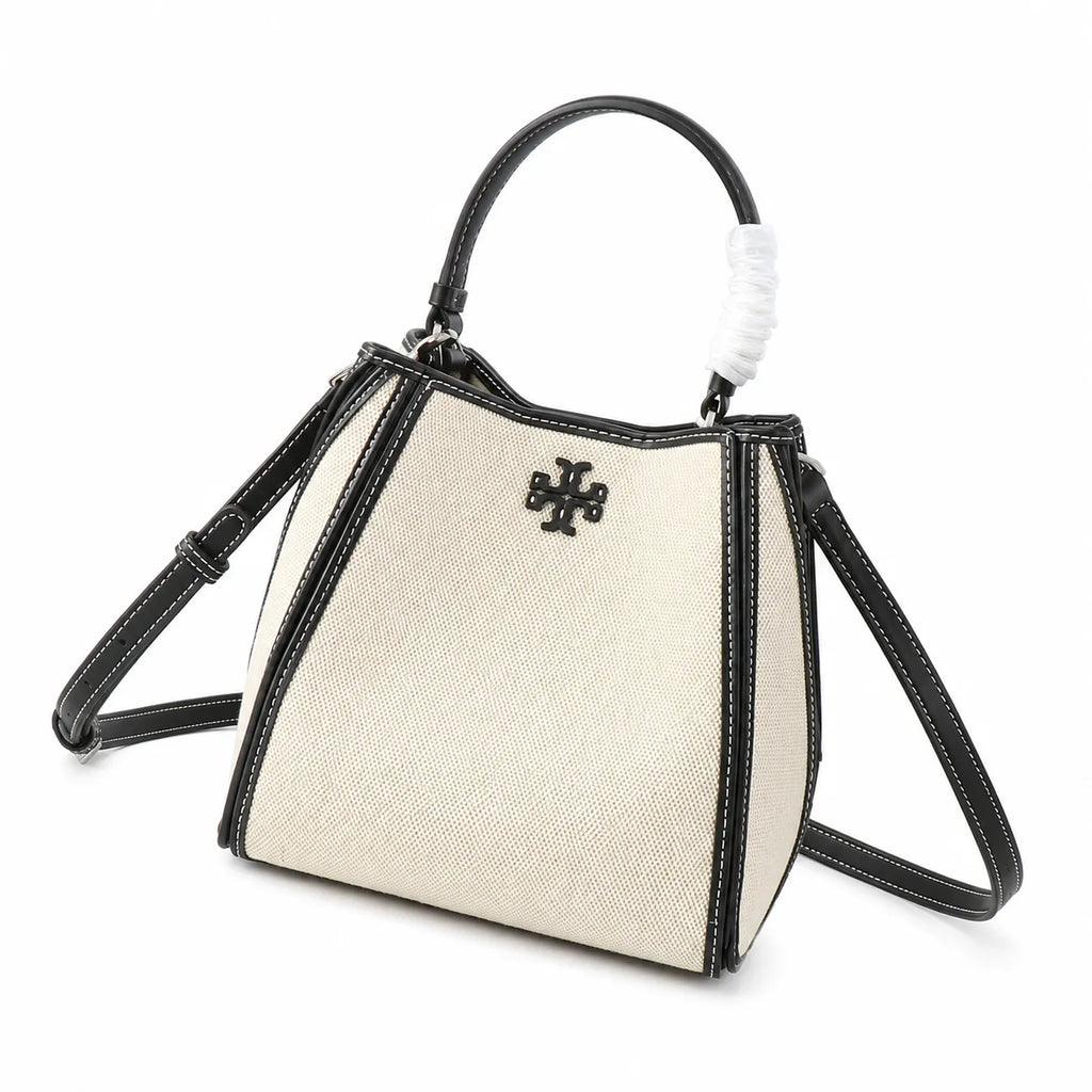 Tory Burch McGraw | Women's designer handbag in off-white canvas with black leather trim detachable handle and adjustable shoulder strap
