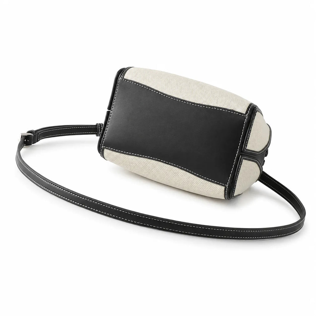 Tory Burch McGraw | Women's designer handbag in off-white canvas with black leather trim detachable handle and adjustable shoulder strap