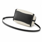 Tory Burch McGraw | Women's designer handbag in off-white canvas with black leather trim detachable handle and adjustable shoulder strap