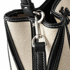 Tory Burch McGraw | Women's designer handbag in off-white canvas with black leather trim detachable handle and adjustable shoulder strap