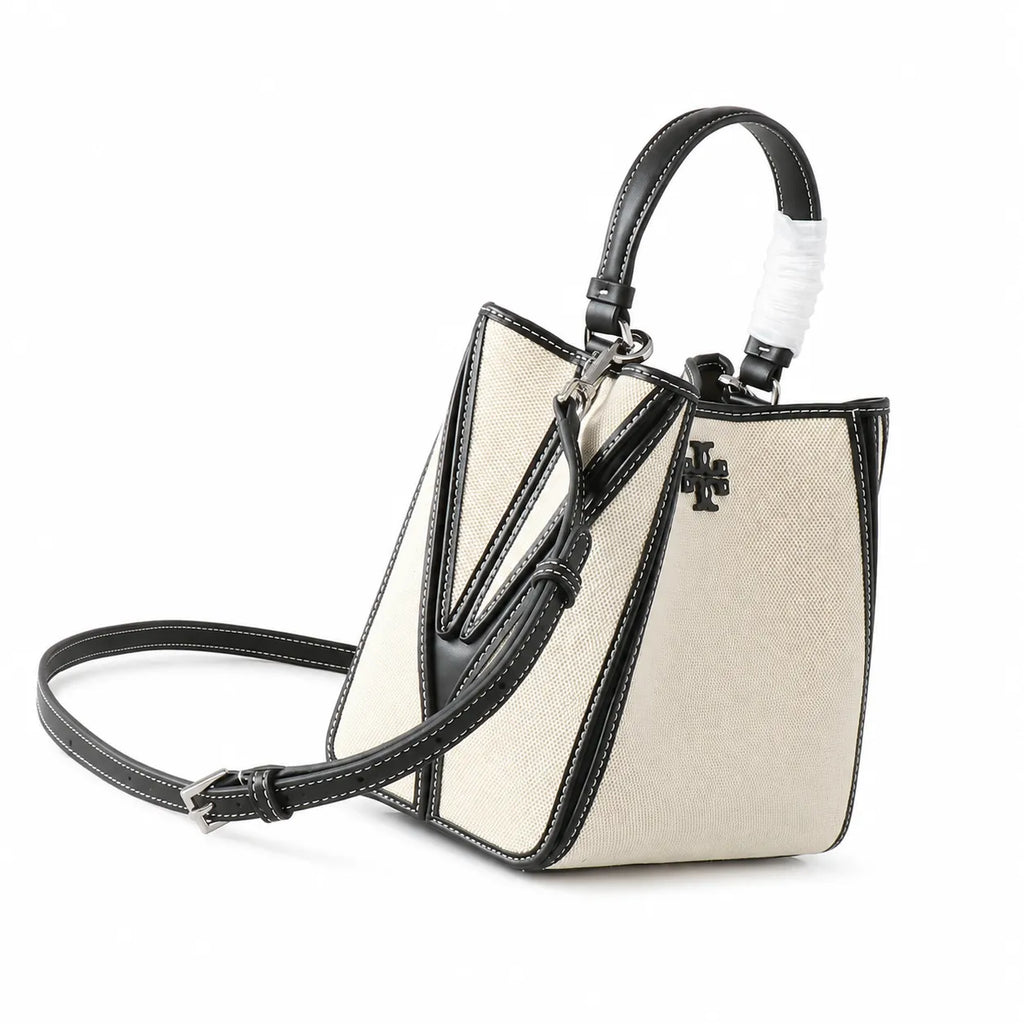 Tory Burch McGraw | Women's designer handbag in off-white canvas with black leather trim detachable handle and adjustable shoulder strap