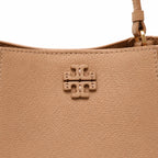 Tory Burch McGraw | Tiramisu pebbled leather handbag with detachable shoulder strap and top handle offering multiple carrying options Designer women's handbag