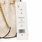 Tory Burch Fleming | Off-white soft lambskin quilted diamond pattern drawstring closure detachable chain/multiple carrying options women's designer handbag