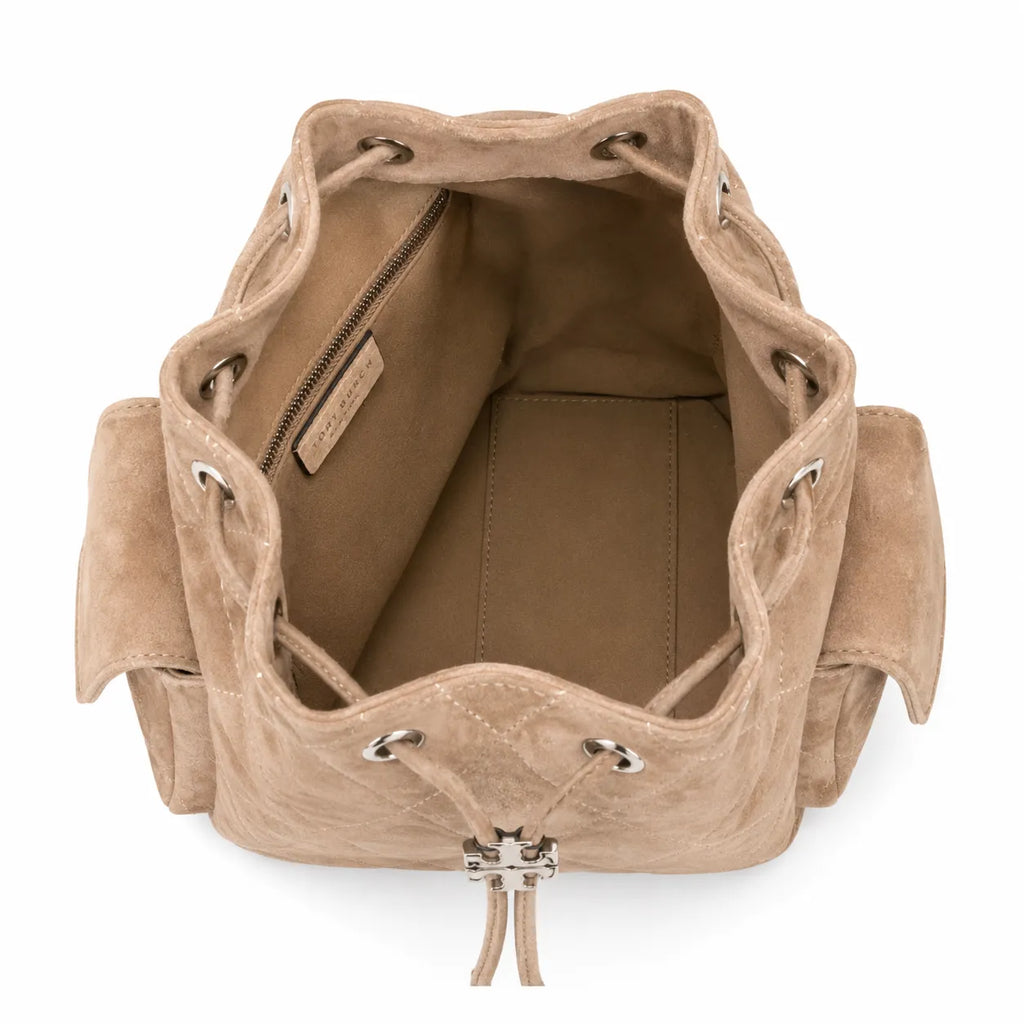 Tory Burch Charlie | Light brown soft suede with diamond stitching drawstring closure and detachable chain A women's designer quilted suede bucket bag offering multiple carrying options