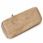Tory Burch Charlie | Light brown soft suede with diamond stitching drawstring closure and detachable chain A women's designer quilted suede bucket bag offering multiple carrying options