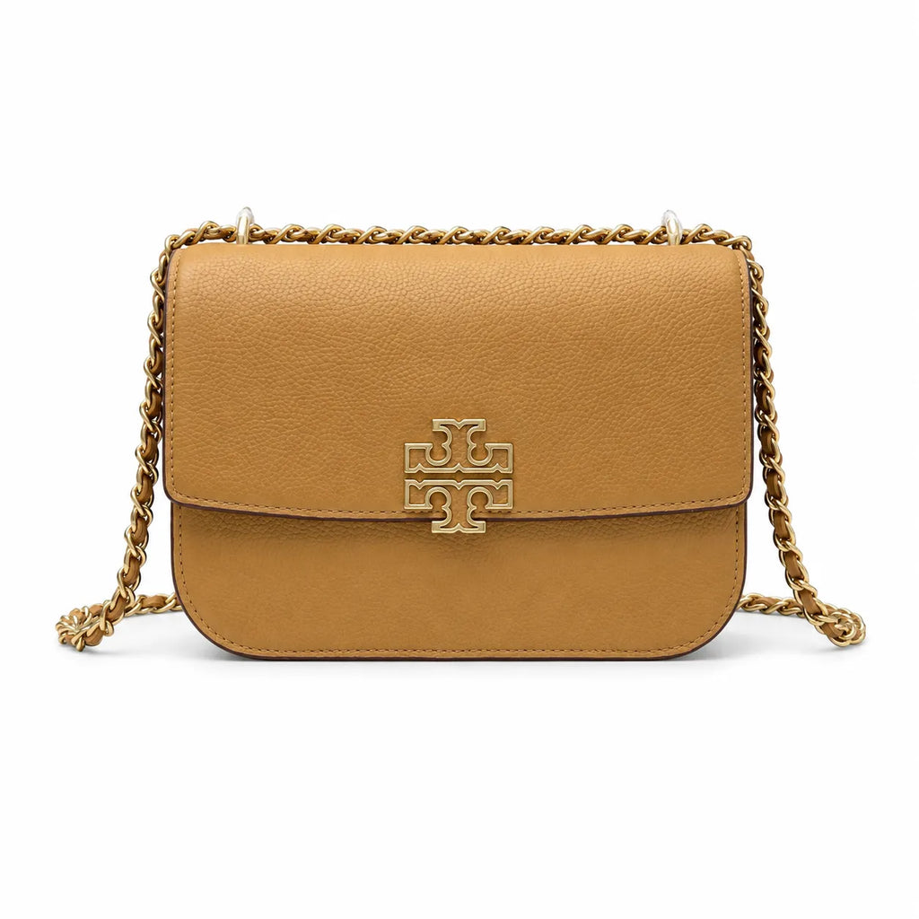 Tory Burch Britten caramel leather handbag with adjustable chain shoulder strap  offering multiple carrying options  A designer handbag for women