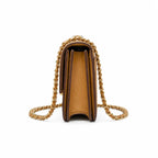 Tory Burch Britten caramel leather handbag with adjustable chain shoulder strap  offering multiple carrying options  A designer handbag for women