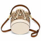 Tory Burch T Monogram | Hazelnut brown Monogram fabric beige leather trim adjustable shoulder strap drawstring closure limited edition women's mini rabbit embroidered bucket bag
