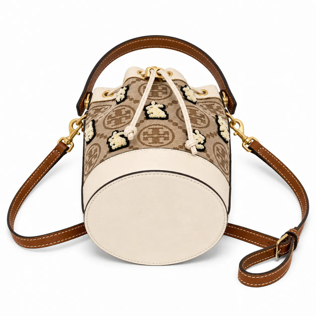 Tory Burch T Monogram | Hazelnut brown Monogram fabric beige leather trim adjustable shoulder strap drawstring closure limited edition women's mini rabbit embroidered bucket bag