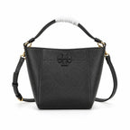 Tory Burch McGraw | Black pebbled leather with an adjustable shoulder strap and top handle offering multiple carrying options  women's designer handbag