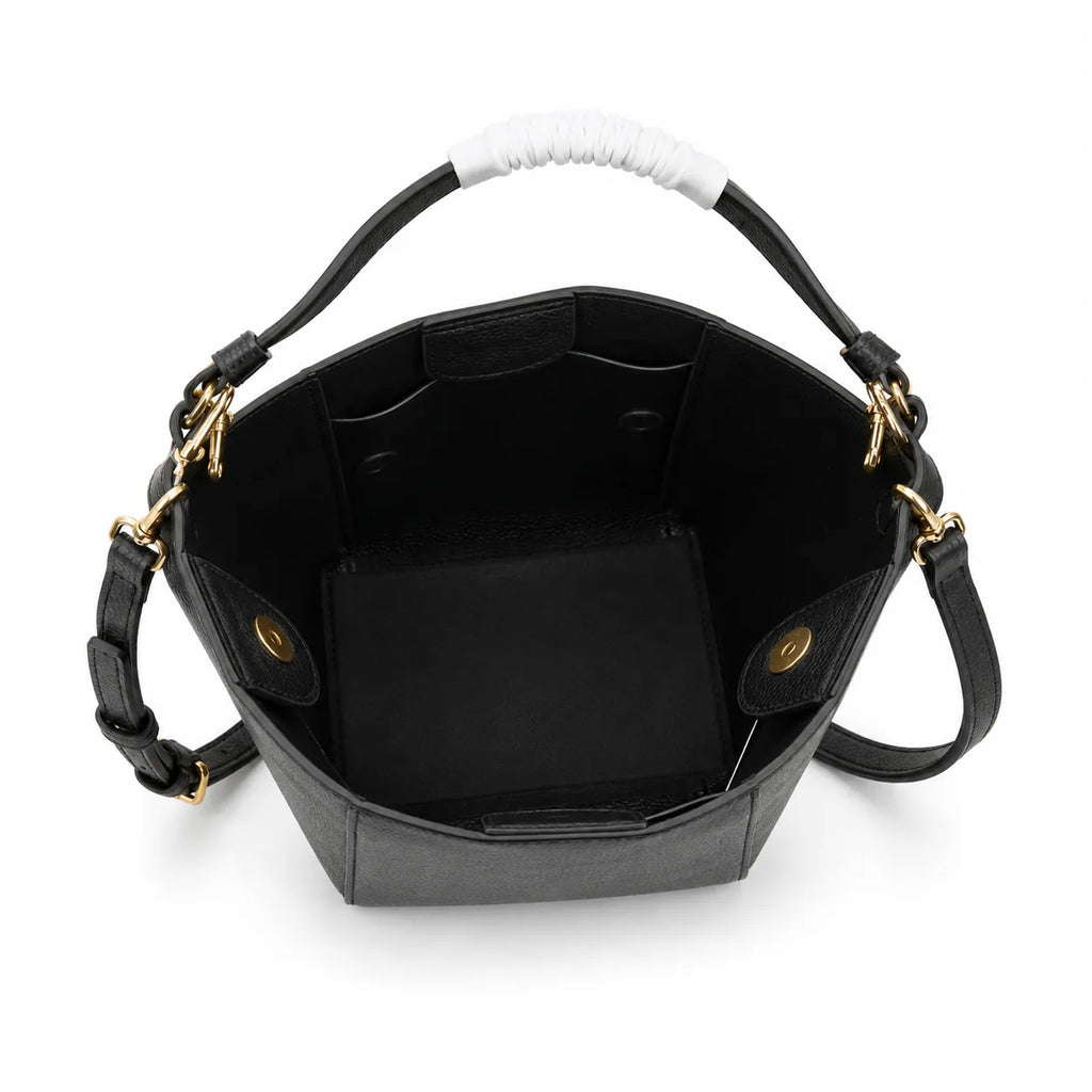 Tory Burch McGraw | Black pebbled leather with an adjustable shoulder strap and top handle offering multiple carrying options  women's designer handbag