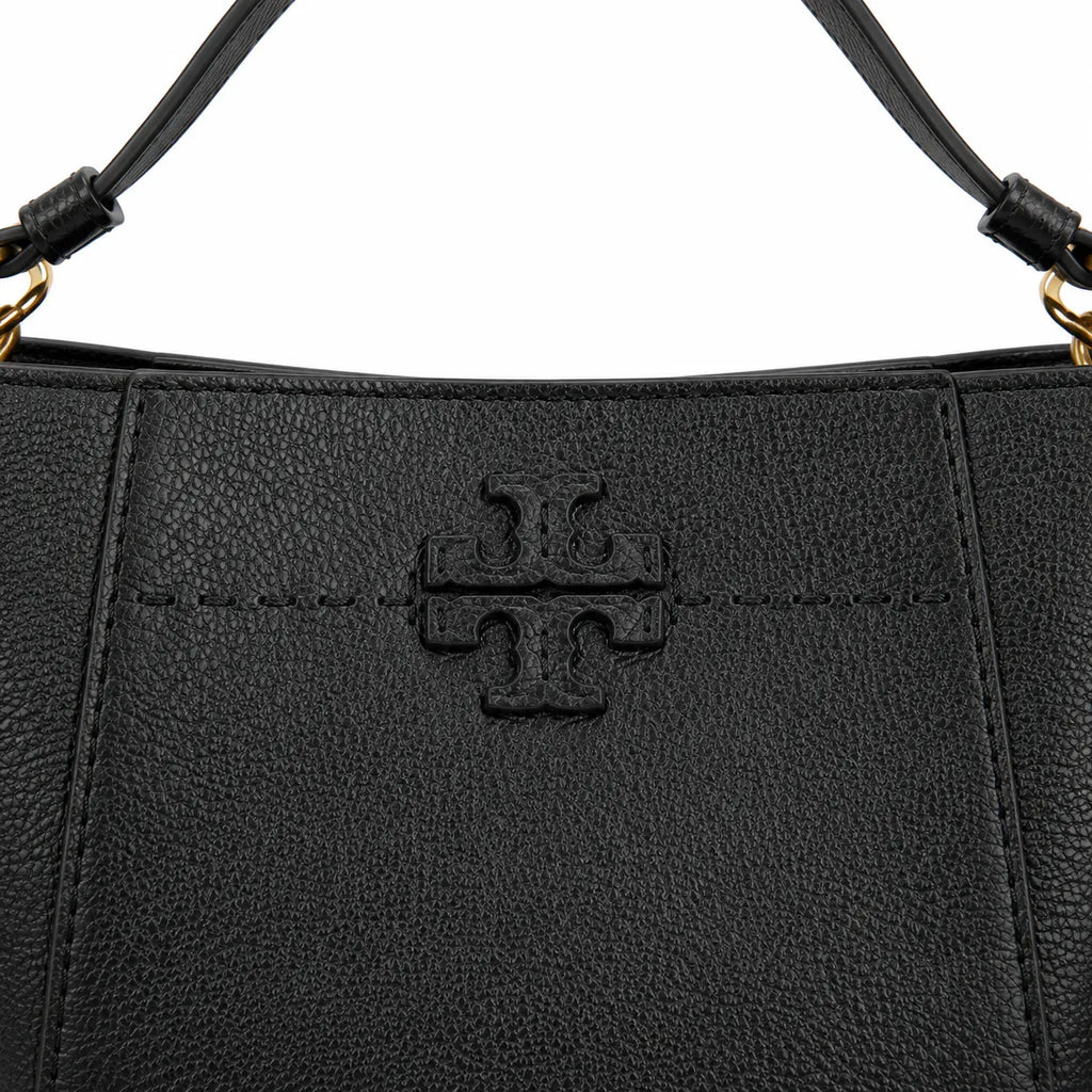 Tory Burch McGraw | Black pebbled leather with an adjustable shoulder strap and top handle offering multiple carrying options  women's designer handbag
