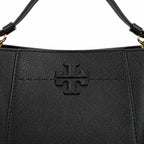 Tory Burch McGraw | Black pebbled leather with an adjustable shoulder strap and top handle offering multiple carrying options  women's designer handbag
