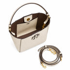 Tory Burch McGraw off-white pebbled leather handbag with adjustable shoulder strap and top handle offering multiple carrying options A women's designer handbag