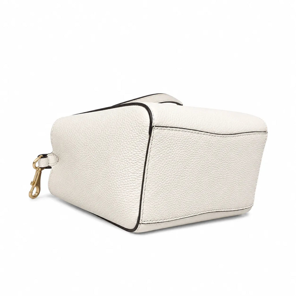 Tory Burch McGraw off-white pebbled leather handbag with adjustable shoulder strap and top handle offering multiple carrying options A women's designer handbag