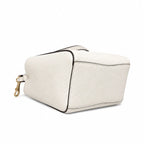 Tory Burch McGraw off-white pebbled leather handbag with adjustable shoulder strap and top handle offering multiple carrying options A women's designer handbag
