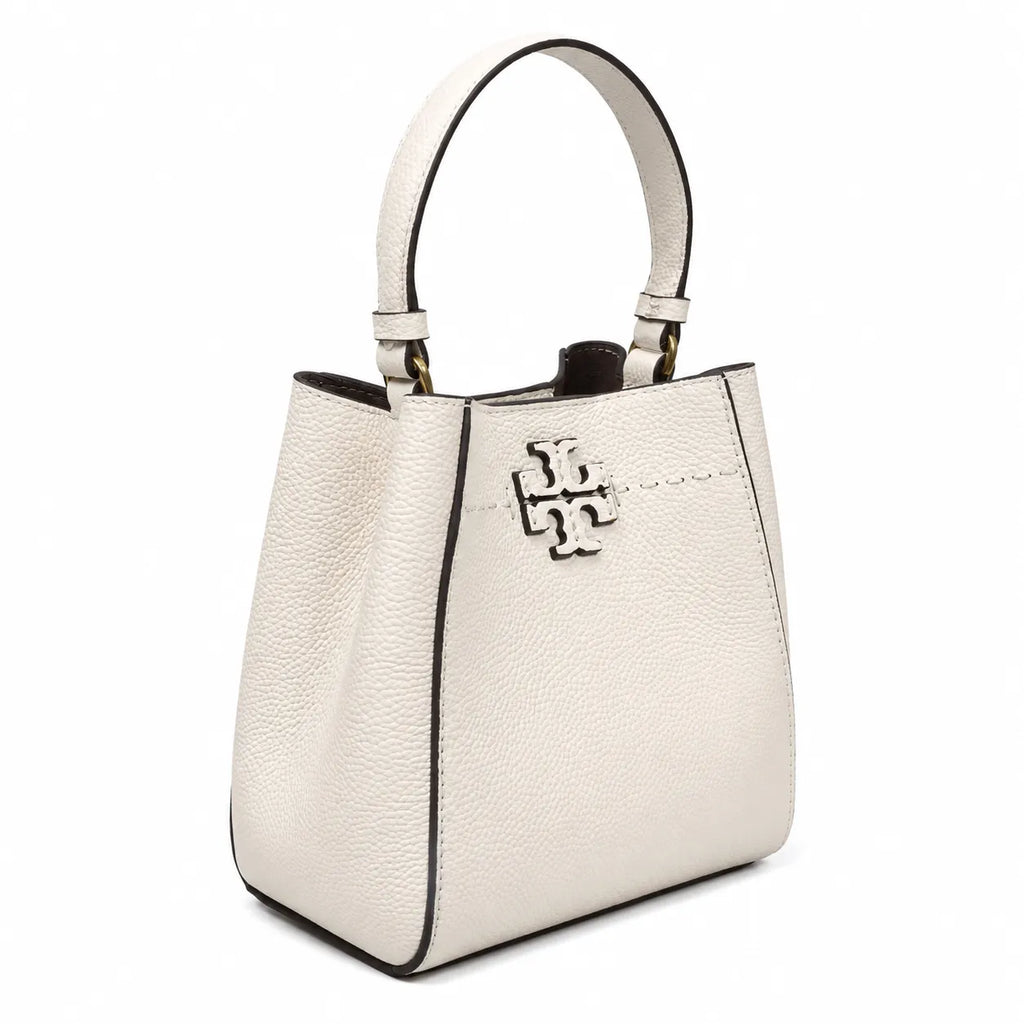 Tory Burch McGraw off-white pebbled leather handbag with adjustable shoulder strap and top handle offering multiple carrying options A women's designer handbag