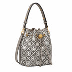 Tory Burch T Monogram bag in grey and white letter jacquard fabric with leather trim drawstring closure and versatile design perfect for commuting and travel