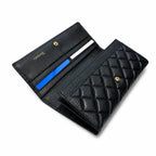 Tory Burch KIRA black quilted leather wallet with multiple card slots and a zippered coin pocket a women's everyday KIRA long wallet
