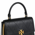 This Tory Burch bag in black leather features a detachable chain shoulder strap and top handle and can be converted into a shoulder bag or crossbody bag for women