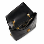 Tory Burch Kira in black calfskin leather with a gold-tone square adjustable chain shoulder strap offering multiple carrying options for women