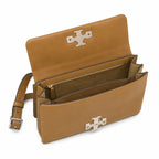 Tory Burch Eleanor wheatgrass green with silver double T adjustable shoulder straps offering multiple carrying options for women