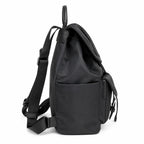 Tory Burch | Black adorned with a silver double-T logo and adjustable shoulder strap lightweight travel/commuter bag