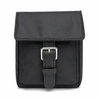 Tory Burch | Black adorned with a silver double-T logo and adjustable shoulder strap lightweight travel/commuter bag
