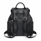 Tory Burch | Black adorned with a silver double-T logo and adjustable shoulder strap lightweight travel/commuter bag