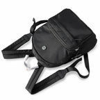 Tory Burch Ella a lightweight travel and commuter bag adorned with a silver double-T logo and an adjustable shoulder strap